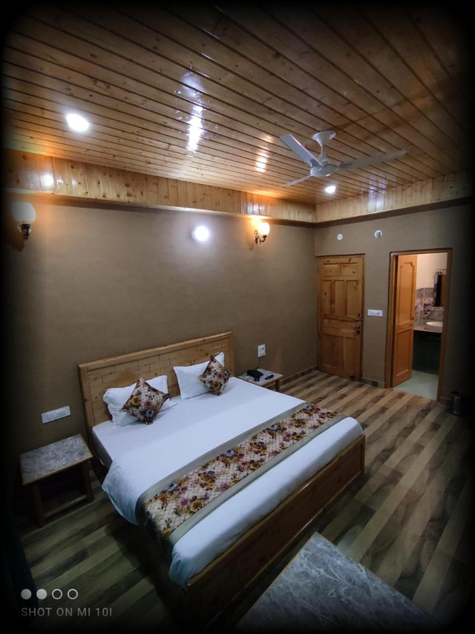 Hotel Cozy Haven Mandi Bagian luar foto